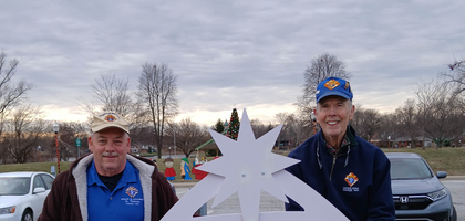 Grand Knight Bob Bush and Joe O’Connor of St. Thomas Council 1347 in Hobart, Ind., gather behind a Nativity scene they installed at the city’s Festival Park. The Knights collaborated with the city’s park district to have the sign displayed for just over a month as part of the council’s Keep Christ in Christmas campaign.