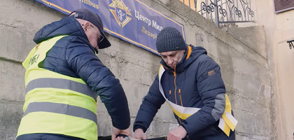 Knights unpack a generator during a delivery at a parish in Ivano-Frankivsk, Ukraine.
