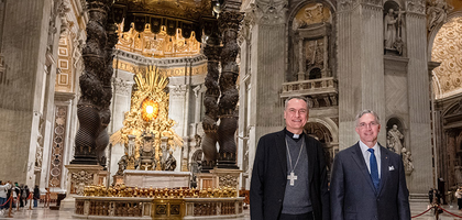 Cardinal Mauro Gambetti, archpriest of St. Peter’s Basilica and president of the Fabbrica di San Pietro, and Supreme Knight Patrick Kelly stand in front of the Bernini baldacchino in St. Peter’s Basilica in Vatican City on Jan. 10. 