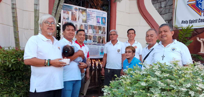 Knights from Holy Spirit Council 13919 in Malolos City, Luzon North, assemble by the council’s meeting place during a memorial prayer service for council members who have died.