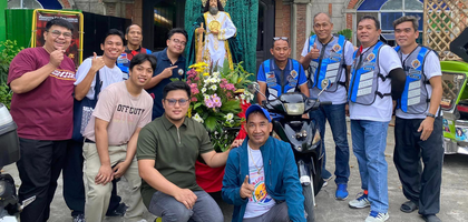 Members of Kristong Hari-St. Augustine Council 16282 in Dasmariñas City, Luzon South, assemble around a statue of St. Jude the Apostle during a St. Augustine Parish celebration on the saint’s feast day. 