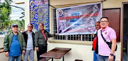 Members of St. Francis of Assisi Council 14381 in San Pablo City, Luzon South, prepare to welcome pregnant women for a free ultrasound event sponsored by the Luzon South State Council. 
