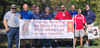Members of Harvester Council 9625 in St. Peters, Mo., assemble after a rosary rally at Laurel Park to pray for greater respect for all human life. 