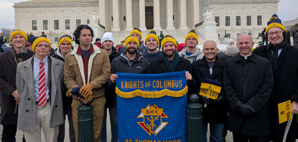Members from St. Thomas More Council 14848 at Ave Maria School of Law in Naples, Fla., gather at the steps of the U.S. Supreme Court at the end of the 52nd annual March for Life in Washington, D.C. After the march, the college Knights participated in the Law of Life Summit, during which they and other college students met with pro-life leaders and lawyers to strategize and network for building a culture of life.