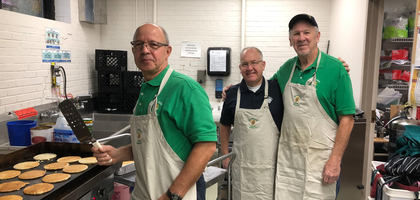 Members of St. Vincent Council 14054 in Akron, Ohio, prepare food for the council’s annual breakfast at St. Vincent de Paul Parish.