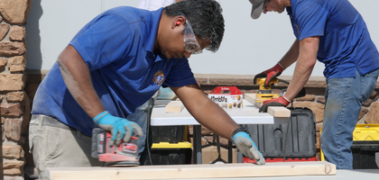 Knights from Immaculate Heart of Mary Council 9270 in Riverview, New Brunswick, prepare wood for a Sleep in Heavenly Peace build event in Moncton. More than 30 Knights and family members helped construct 15 beds that were distributed to local families in need. (Photo by Dale Preston)
