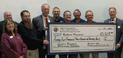 Knights from Mansfield (Ohio) Council 687, Joseph Scholl Council 4448 and Walt Keppler Council 8357 present a check for more than $45,000 to Amy Kahl (right), executive director, and staff members from Richland Pregnancy Services in Mansfield. Half of the donation was raised by the councils, with the remaining half provided by the Supreme Council through the Ultrasound Initiative.