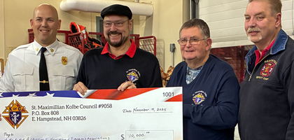 Members of St. Maximilian Kolbe Council 9058 in East Hampstead, N.H., present a $10,000 check — proceeds from the council’s 23rd annual charity golf tournament — to members of Atkinson’s and Hampstead’s firefighters associations at the Atkinson Fire Department. Both towns’ fire departments received $5,000 to help purchase lifesaving equipment. The golf tournament raised an additional $13,000 for other charities supported by the council.