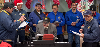 Members of St. Augustine Council 9714 in South San Francisco, Calif., sing Christmas carols to residents at Stella Day Program, an assisted-living home. The Knights visited for about four hours, giving gifts, playing games and providing lunch to residents.