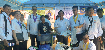 Knights from Don Febian R. Millar Council 5973 in Tayabas, Luzon South, gather during the council’s food and clothing giveaway. More than 20 Knights helped distribute boxed meals and clothing to 150 families from the Aeta community.