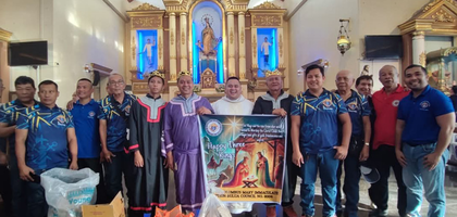 Knights from St. Mary Immaculate Conception Council 8006 in Bulua, Mindanao, assemble in front of the sanctuary at Immaculate Conception Parish during the council’s annual Epiphany snack distribution. 