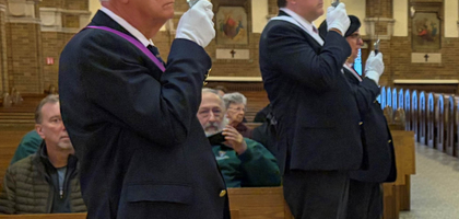 Fourth Degree Knights from Msgr. Schulte Assembly 492 in Dearborn, Mich., provide an honor guard for a Mass and memorial service at Sacred Heart Parish honoring members of Father Patrick O’Kelley Council 3860 who have died. Every year, a chalice engraved with the names of deceased Knights from the previous year is presented to a priest. The 2025 recipient was Father Pat Bruen, a newly ordained priest and brother Knight, whose father’s name was included on the chalice. About 300 people attended the liturgy.