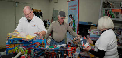 Knights and volunteers from Father Theobald Spetz Council 5135 in Waterloo, Ontario, organize donations to the council’s annual toy drive for families and children in need. 