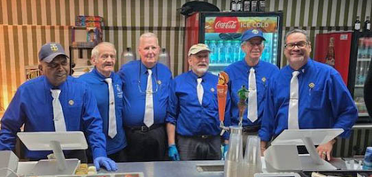 Knights from St. Mary’s Council 11878 in Pensacola, Fla., work a concession stand during an event at the Pensacola Bay Center. The council has manned the stand for about 20 years, raising $52,300 for its programs — including ASAP (Aid and Support After Pregnancy) and Refund Support Vocations Program (RSVP) — in 2025. Recently, the council donated more than $5,000 to Alpha Center, Inc., a pregnancy resource center, which received an additional $400 from the Supreme Council through ASAP.