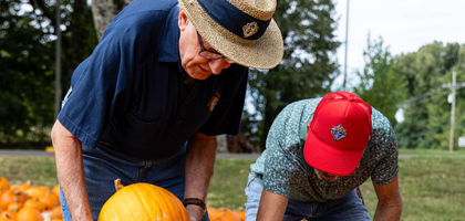 Knights from Hernando de Soto Council 7120 in Southaven, Miss., tend the council’s pumpkin patch, which raises approximately $3,000 annually. The proceeds support local charities such as Sacred Heart Southern Missions, which provides food, shelter and clothing for families in need. (Photo by Brad Vest)