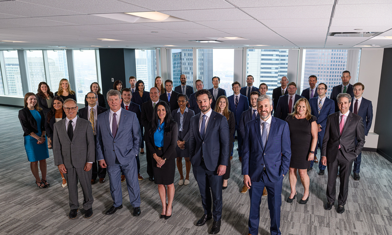 The Knights of Columbus Asset Advisor's team, standing and posing together for a photo.