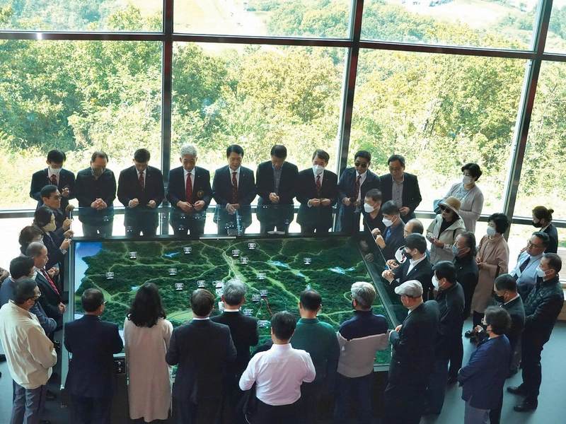 Knights and their families pray a rosary for peace at the Dora Observatory, near the border between South Korea and North Korea.