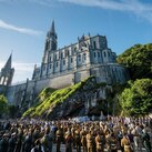 Warriors to Lourdes pilgrims and other military personnel gather for Mass at the Grotto beneath the Basilica of Our Lady of the Rosary.