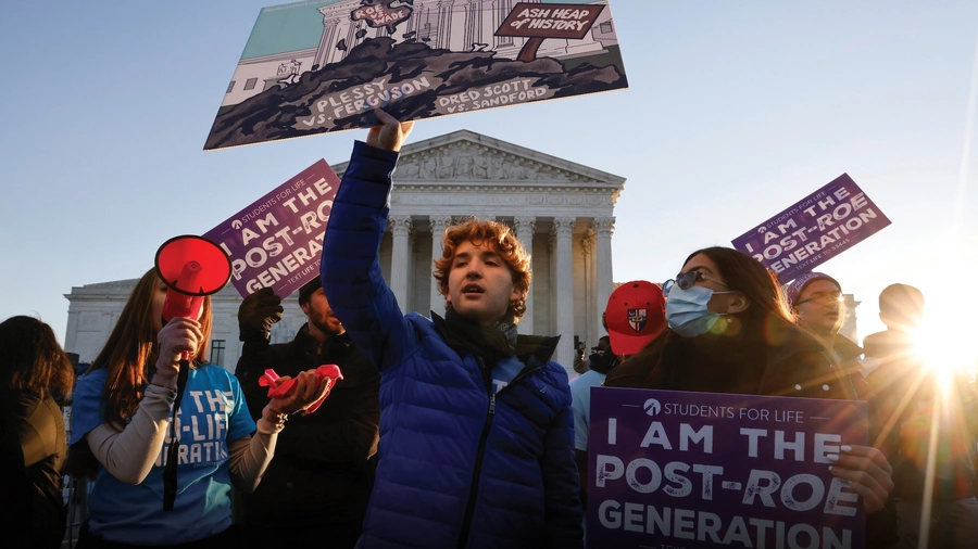 Pro-life students peacefully demonstrate outside of the U.S. Supreme Court building Dec. 1, 2021.