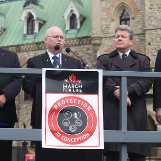 Knights of Columbus leaders speak before the March for Life through downtown Ottawa on May 8.