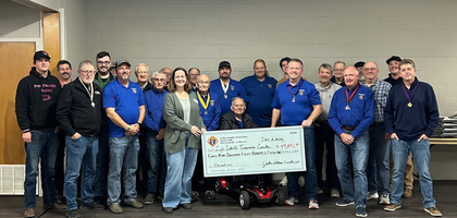 Members of Trinity Council 1466 in Le Mars, Iowa, present a check for nearly $50,000 to Jessica La Fleur, executive director of Life Skills Training Center, which helps adults with disabilities find employment and develop general work skills. 