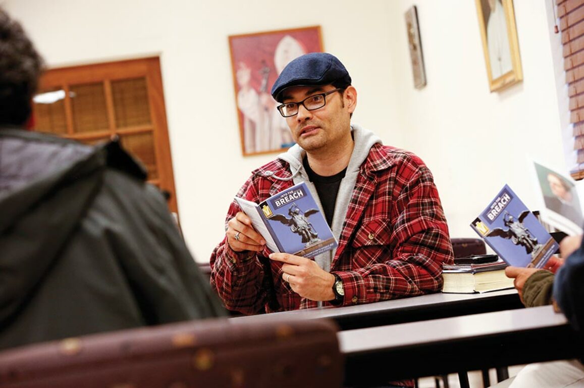 A man during discussion about the Into the Breach initiative from the Knights of Columbus.