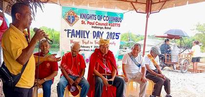 A member of St. Paul Council 10775 in Inabanga, Visayas, speaks during a Family Day event attended by about 80 people. 