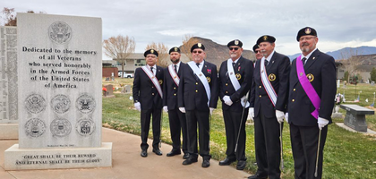 Members of Bishop Scanlan Assembly 2393 in St. George, Utah, stand together after a Wreath Across America ceremony at Tonaquint Cemetery. 