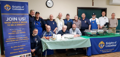 Members of St. John the Baptist Council 7333 in Allentown, N.J., prepare to serve food during the monthly family breakfast at St. John the Baptist Parish.