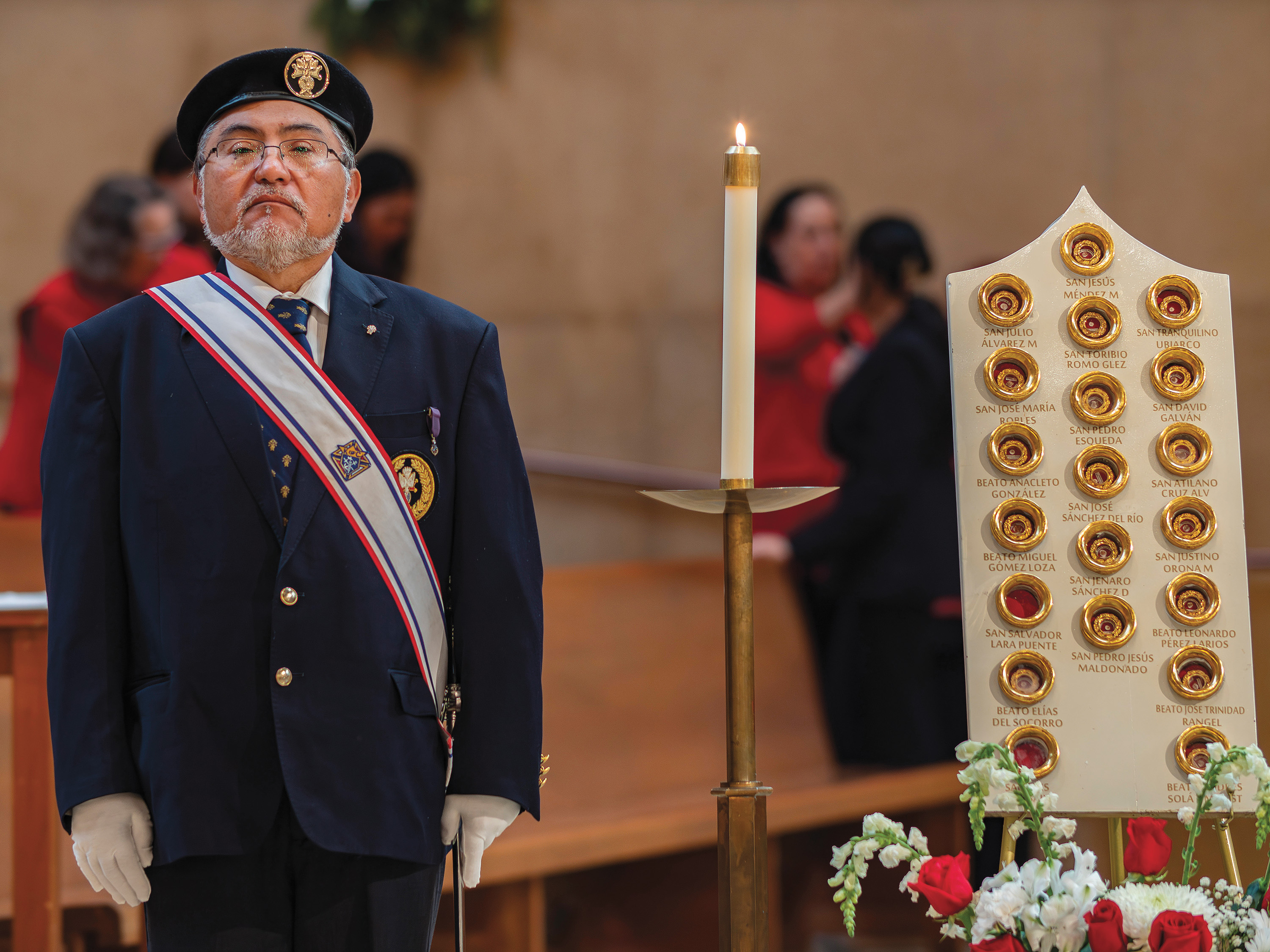 Jes&uacute;s Bar&oacute;n stands guard next to relics of Mexican martyrs during an April 18 veneration at the Cathedral of Our Lady of the Angels.