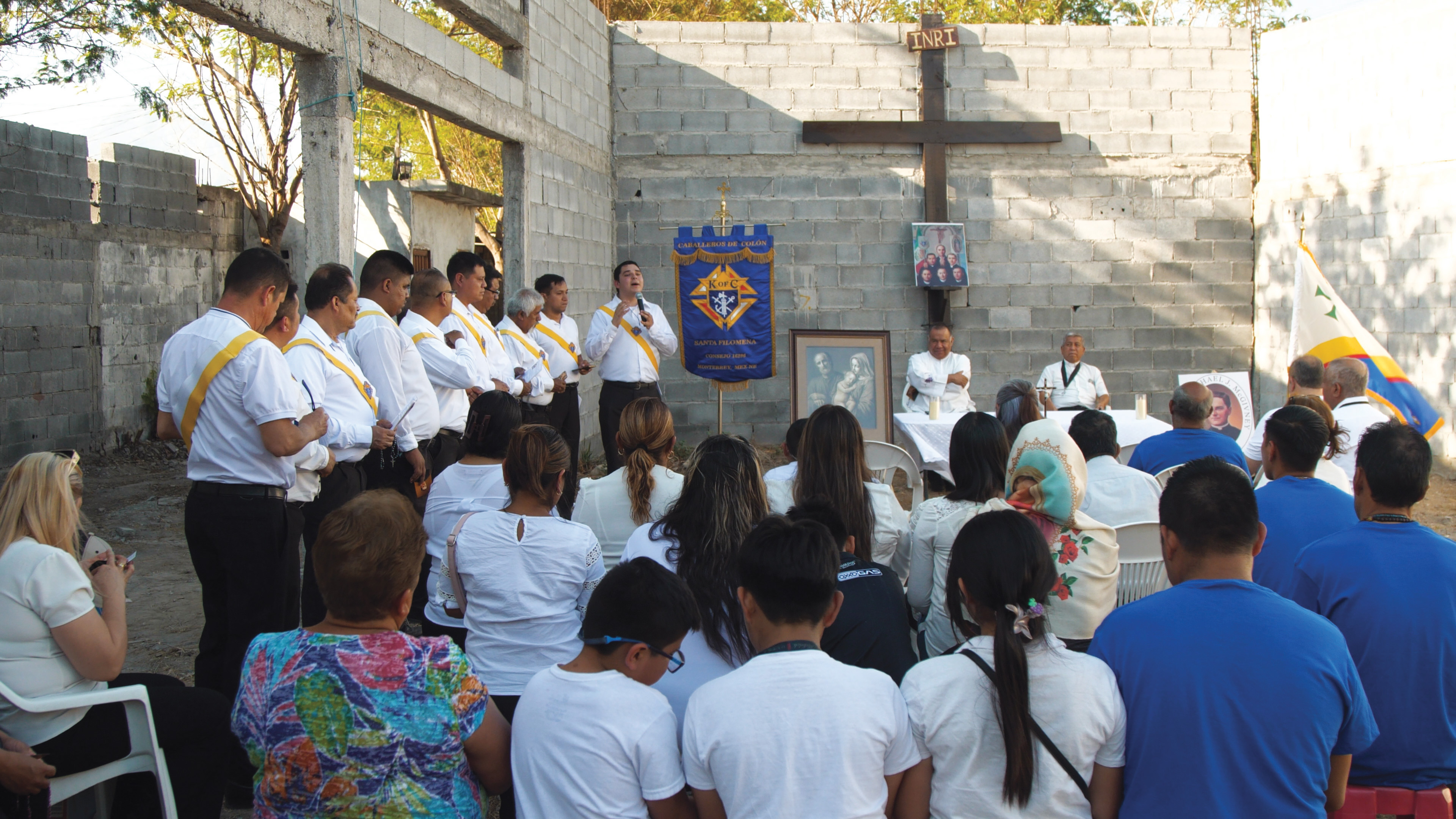 Joel Aguirre (center) speaks on behalf of Santa Filomena Council 16296 during an event at El Se&ntilde;or de los Afligidos Chapel in Monterrey.