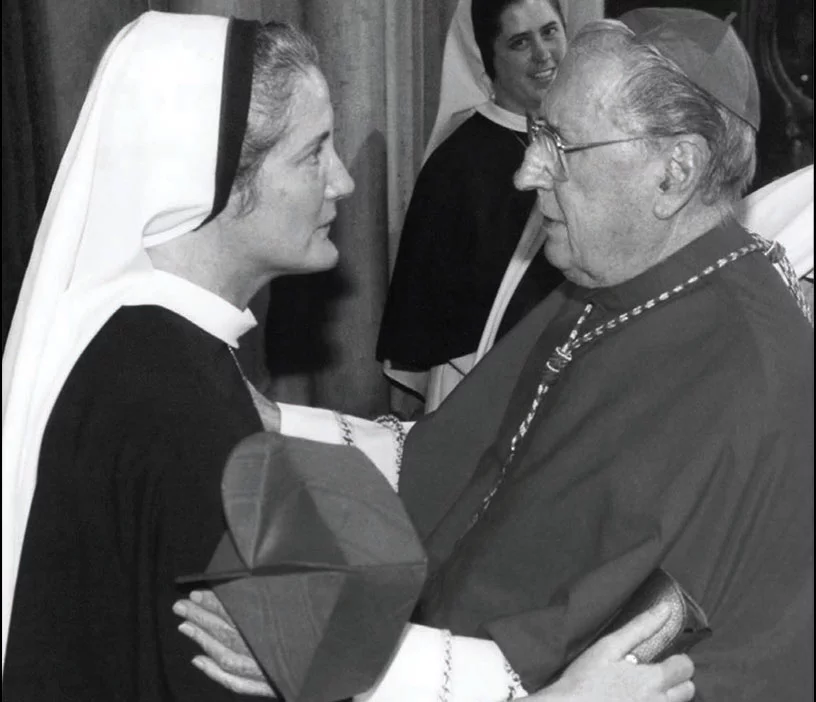 Mother Agnes Mary Donovan, superior general of the Sisters of Life, and Cardinal John J. O’Connor greet one another in St. Patrick’s Cathedral.