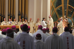Archbishop Paul S. Coakley of Oklahoma City leads bishops in consecrating the United States to the Sacred Heart of Jesus at the Basilica of the National Shrine of Mary, Queen of the Universe in Orlando, Fla.