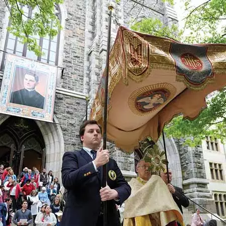 SETON ROUTE | Escorted by members of San Salvador Council 1, Auxiliary Bishop Juan Miguel Betancourt of Hartford carries the Eucharist in procession from St. Mary’s Church to St. Joseph’s Church in New Haven, Conn., as the Seton Route of the National Eucharistic Pilgrimage begins May 19.