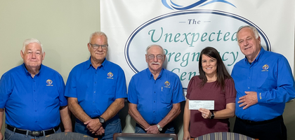 Members of New Iberia (La.) Council 1208 present a $6,000 check to Jennifer Boutte, director of Unexpected Pregnancy Center.