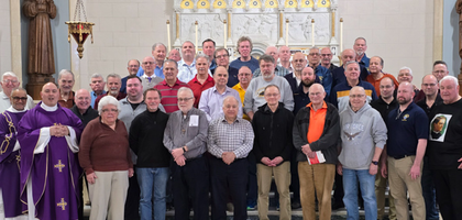 Members of several New York councils gather in front of the chapel sanctuary at Mount Alvernia Retreat Center during the New York State Council’s annual Lenten retreat, titled “Our Hope in the Heart of Jesus.” 