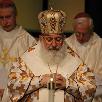 Cardinal Lubomyr Husar, who led the Ukrainian Greek Catholic Church from 2001 to 2011, prays during the opening Mass of the 123rd Supreme Convention in 2005. His remarks at the convention were instrumental in bringing the Order to Ukraine.