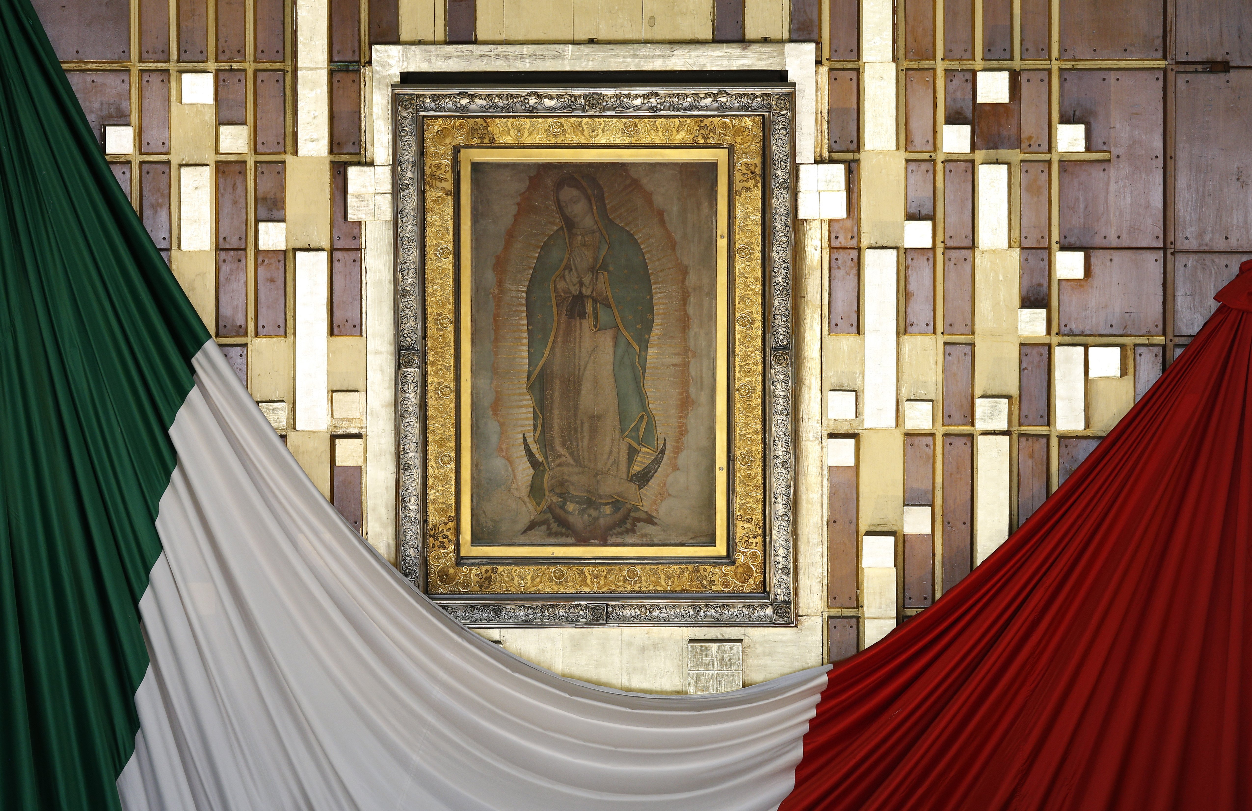 The original image of Our Lady of Guadalupe imprinted on the cloak of St. Juan Diego is seen in the basilica in Mexico City. (CNS photo/Paul Haring)