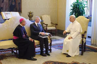 Pope Leo XIV speaks with Supreme Knight Patrick Kelly and Supreme Chaplain Archbishop William Lori.