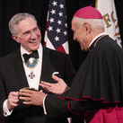 Supreme Knight Patrick Kelly accepts the Path to Peace Award.