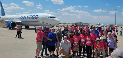 Colorado State Deputy Marc Salome (front, gray shirt) and other members of the Colorado State Council team gather during the annual plane pull at Denver International Airport in support of Special Olympics Colorado. Our Lady of the Angels Council 15857 in Mead, Colo., helped organize the event. More than 3,000 people participated, including 30 Knights from several local councils who formed an additional K of C team. Together, the two K of C teams raised over $5,500 in support of Special Olympics Colorado.