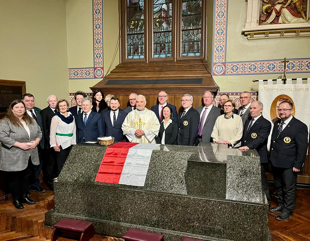Polish Knights gather around the tomb of Blessed Michael McGivney at St. Mary&rsquo;s Church in New Haven, Conn., during their pilgrimage in February.