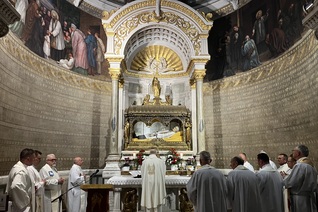 Polish Knights of Columbus chaplains celebrate Mass at the tomb of St. John Vianney at the Basilica of Ars in Ars-sur-Formans, France.