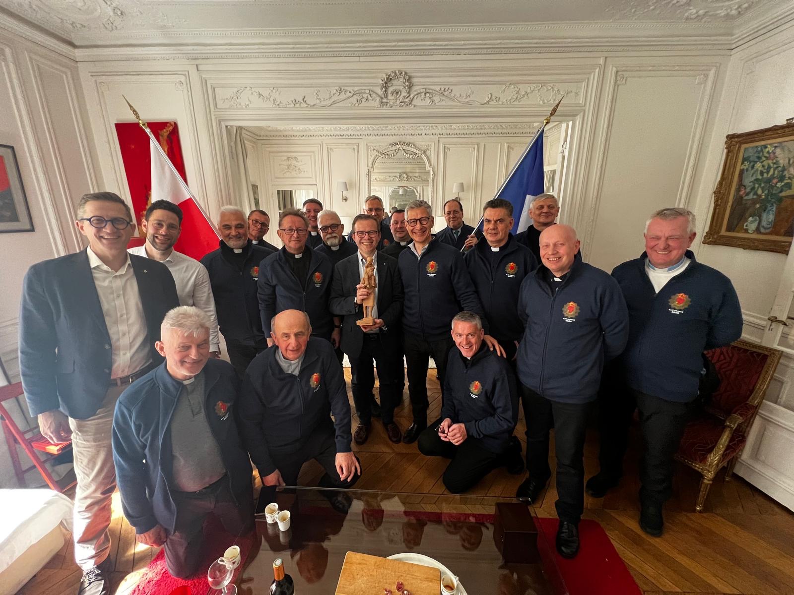 Polish Knights of Columbus chaplains and French Knights gather for a meeting in Paris.
