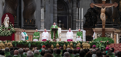 Pope Francis is pictured with the newly restored medieval crucifix (at right) during the Jubilee Mass for Prisoners in St. Peter’s Basilica Nov. 6, 2016.