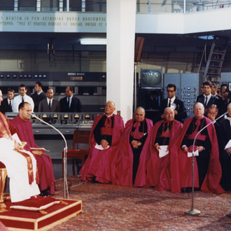 Pope Paul VI seated, left, in Vatican Radio Station, to bless the new 100 kW short wave radio transmitters, June 30, 1966.