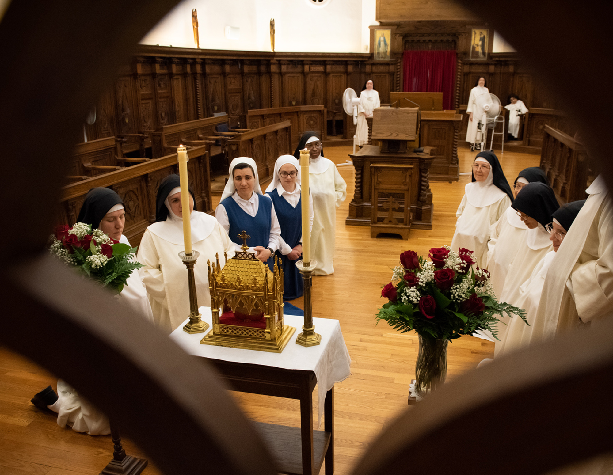 Cloistered Dominican nuns and postulants venerate the incorrupt heart relic of St. Jean Vianney