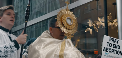 A Eucharistic Procession through city streets reminds us to draw close to Christ in the Blessed Sacrament.