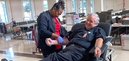 Father Paddy Mockler, pastor of Most Holy Trinity Catholic Church and chaplain of Most Holy Trinity Council 11995 in Pass Christian, Miss., donates blood during one of Council 11995’s semiannual drives.