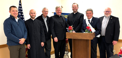 Faithful Navigator Michael Kelly (second from right) of Father Francis Heindl Assembly 1902 in Tomah, Wis., stands with priests and deacons from the Diocese of La Crosse during the assembly’s annual clergy appreciation dinner.